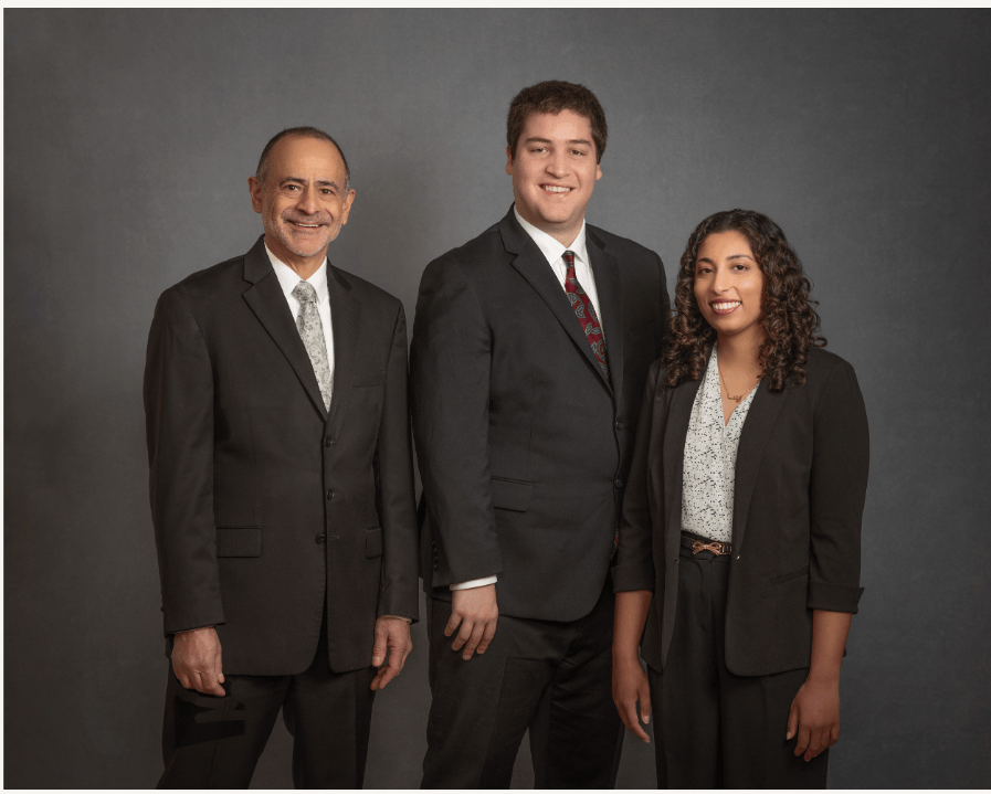 Photo of attorneys at Roumel Law